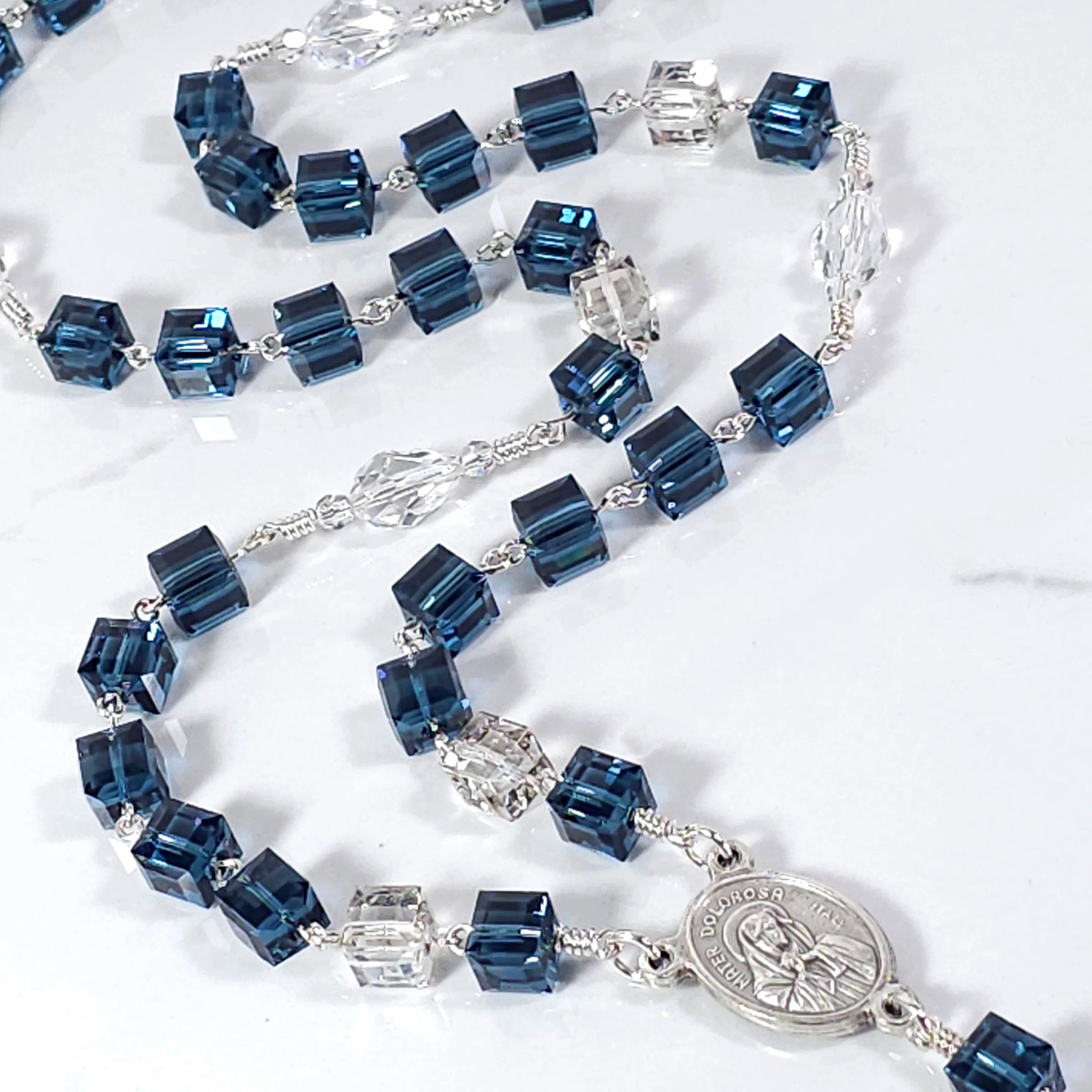 Beautiful Our Lady of tears chaplet with blue Swarovski crystals, symbolizing Mary's seven sorrows