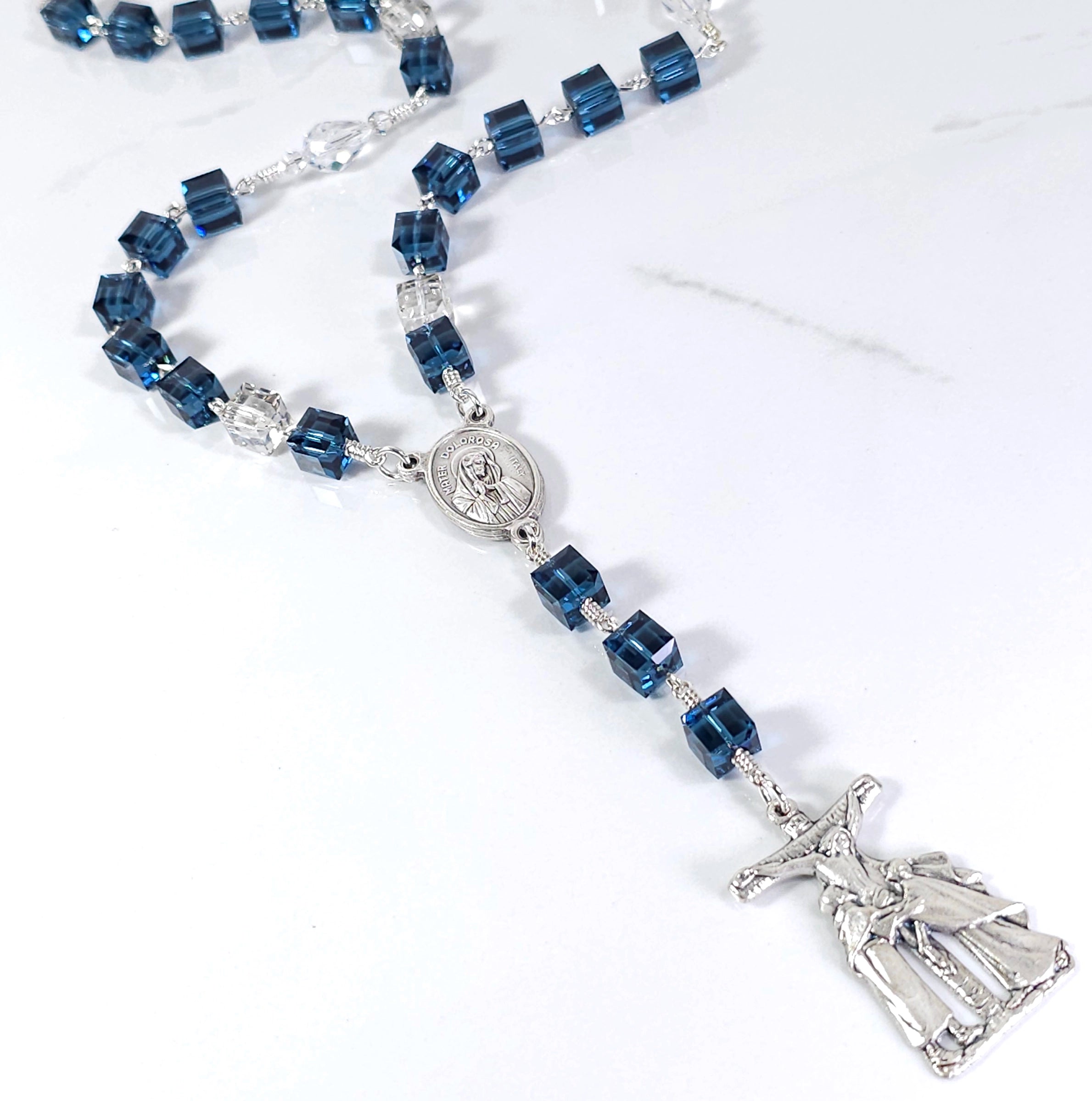 Handcrafted Mater Dolorosa rosary featuring blue Swarovski crystals and intricate design