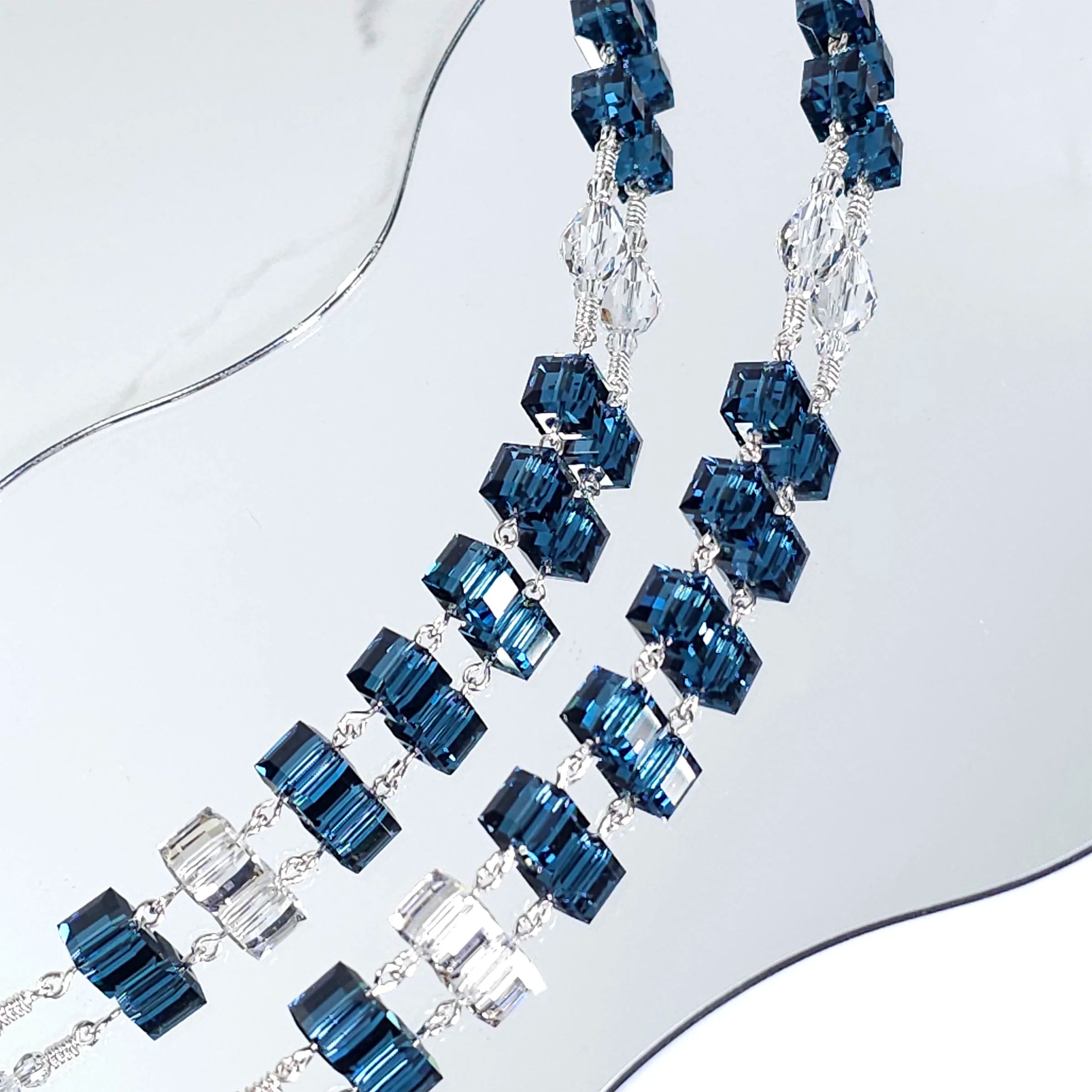Elegant blue Swarovski crystal rosary honoring the Seven Sorrows of Mary, ideal for devotion