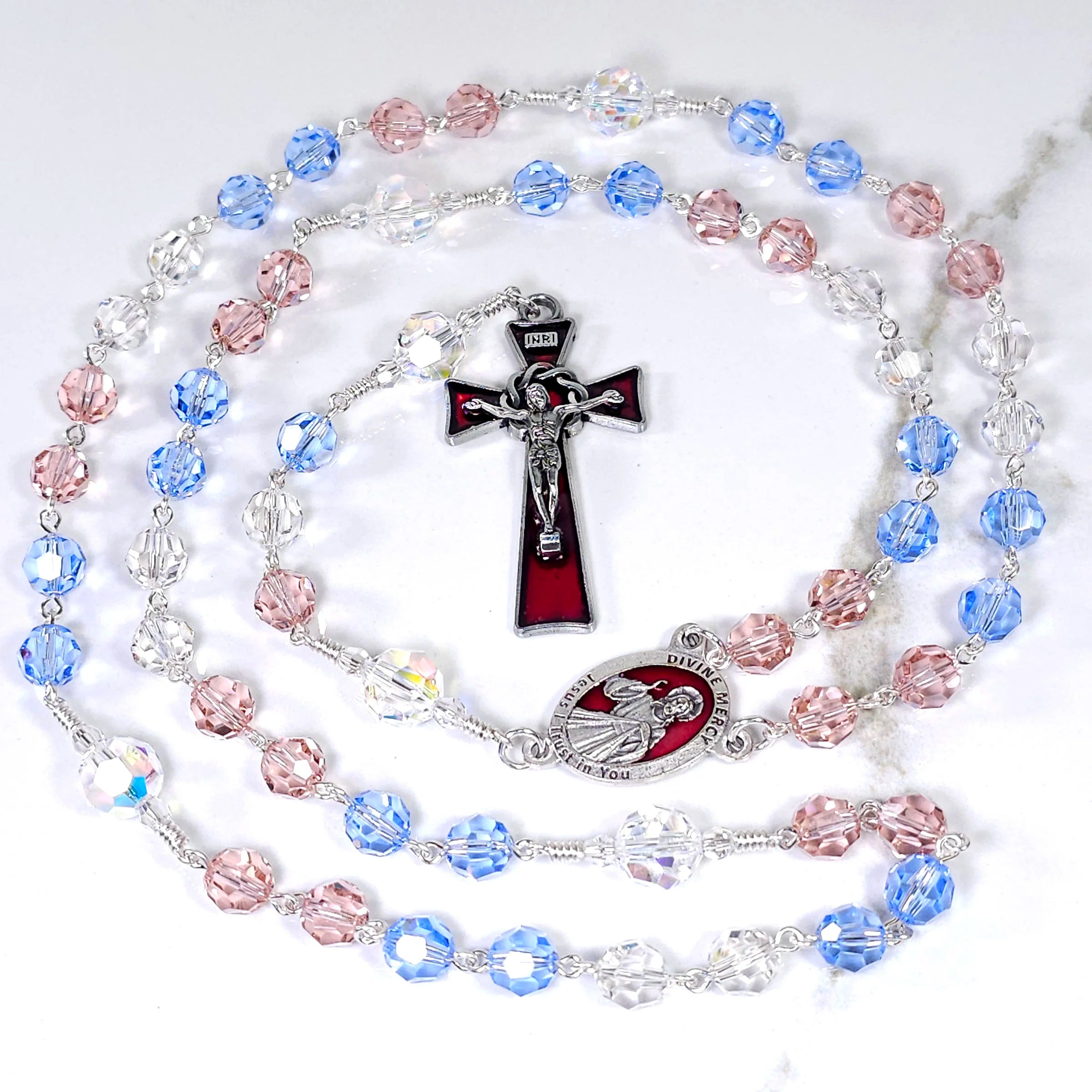 Beautiful Divine Mercy heirloom rosary adorned with red, white, and blue Swarovski beads.
