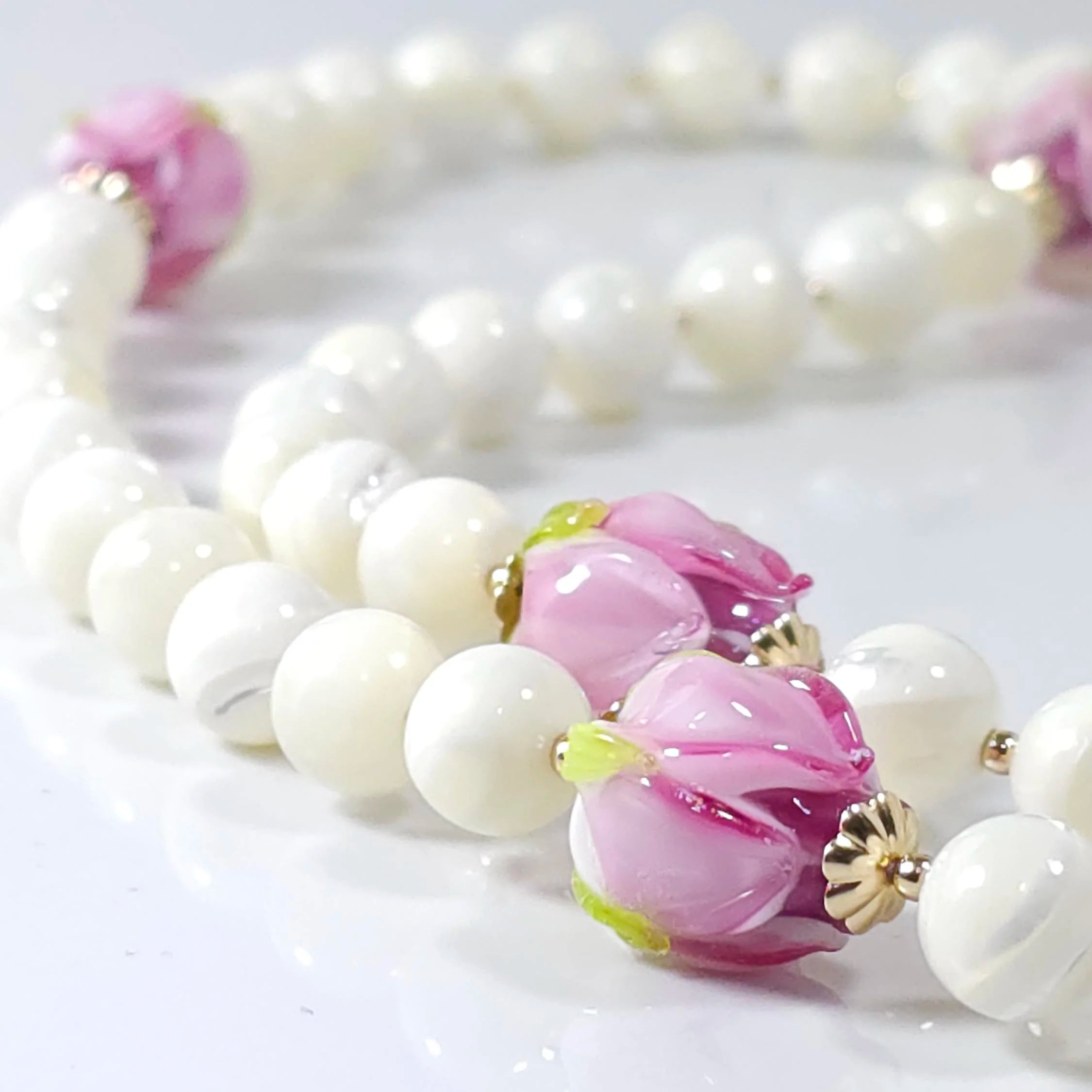 Madonna mystical rose rosary made from white mother of pearl.