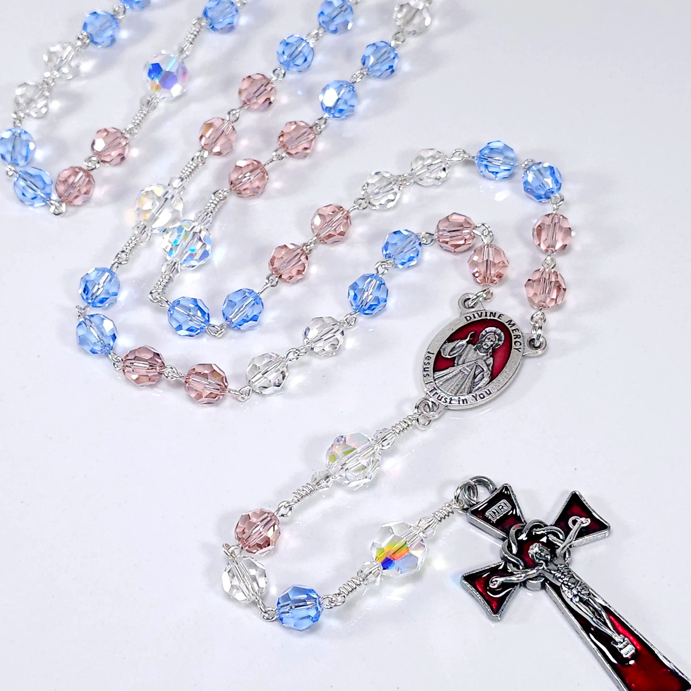 Elegant Divine Mercy heirloom rosary featuring red, white, and blue Swarovski crystals.