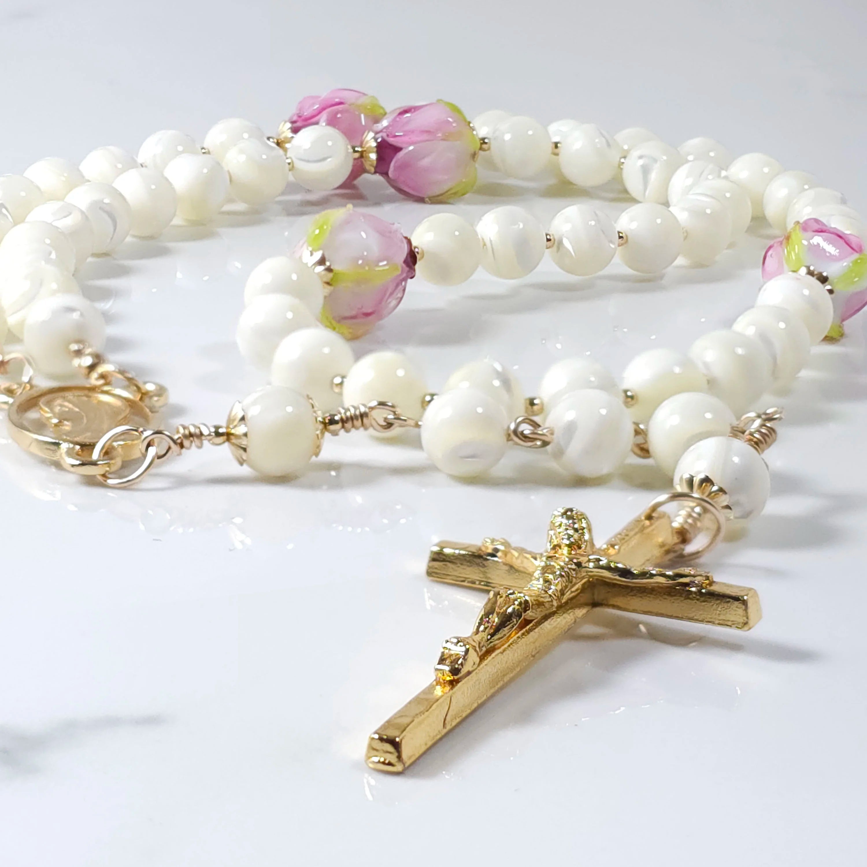 Madonna Della Rosa white pearl rosary.
