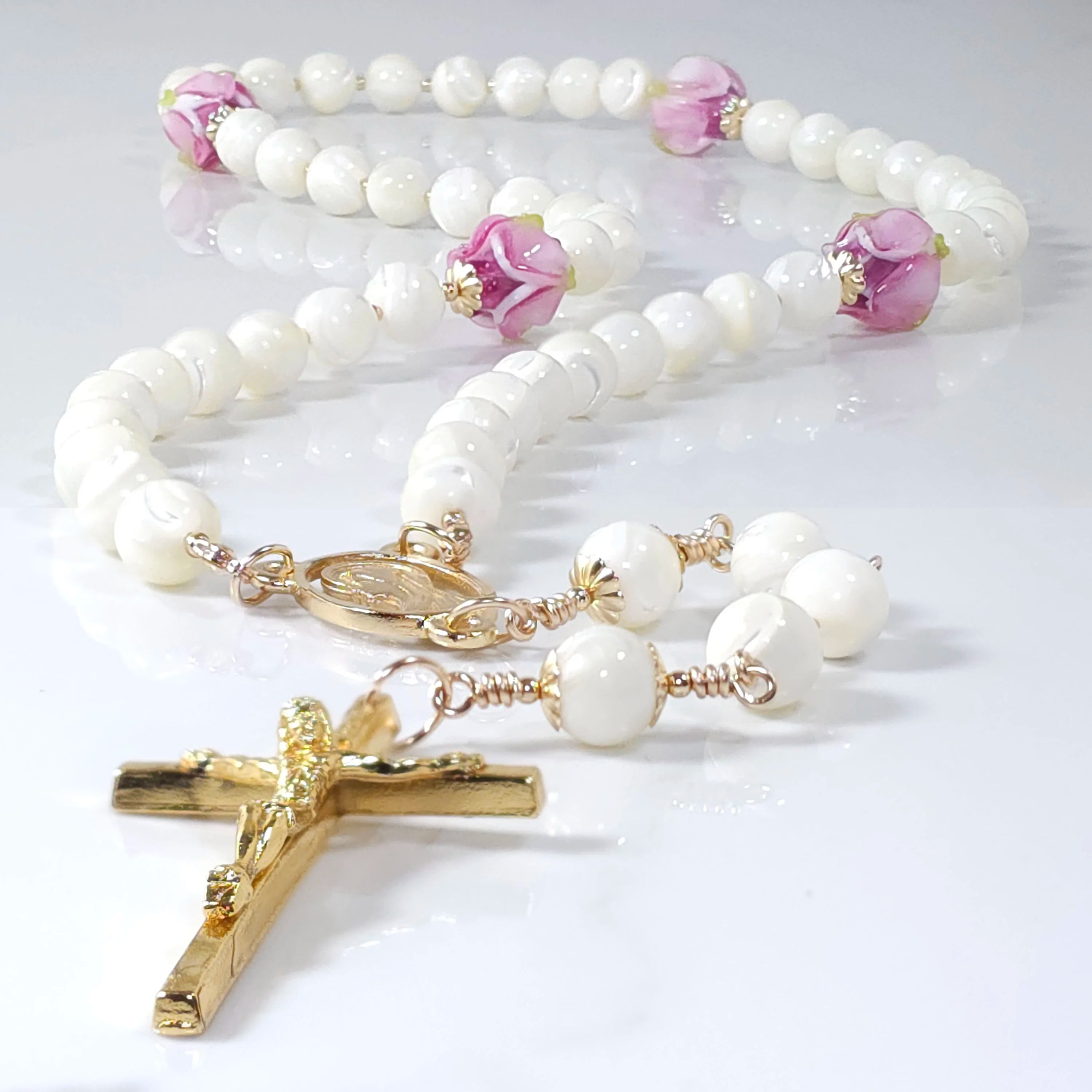 White mother of pearl rosary.