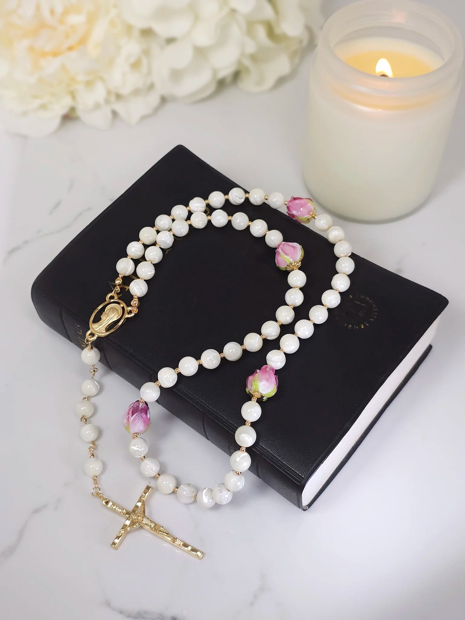 Handcrafted rosary with Mother of Pearl, showcasing a Gold-plated Crucifix pendant.