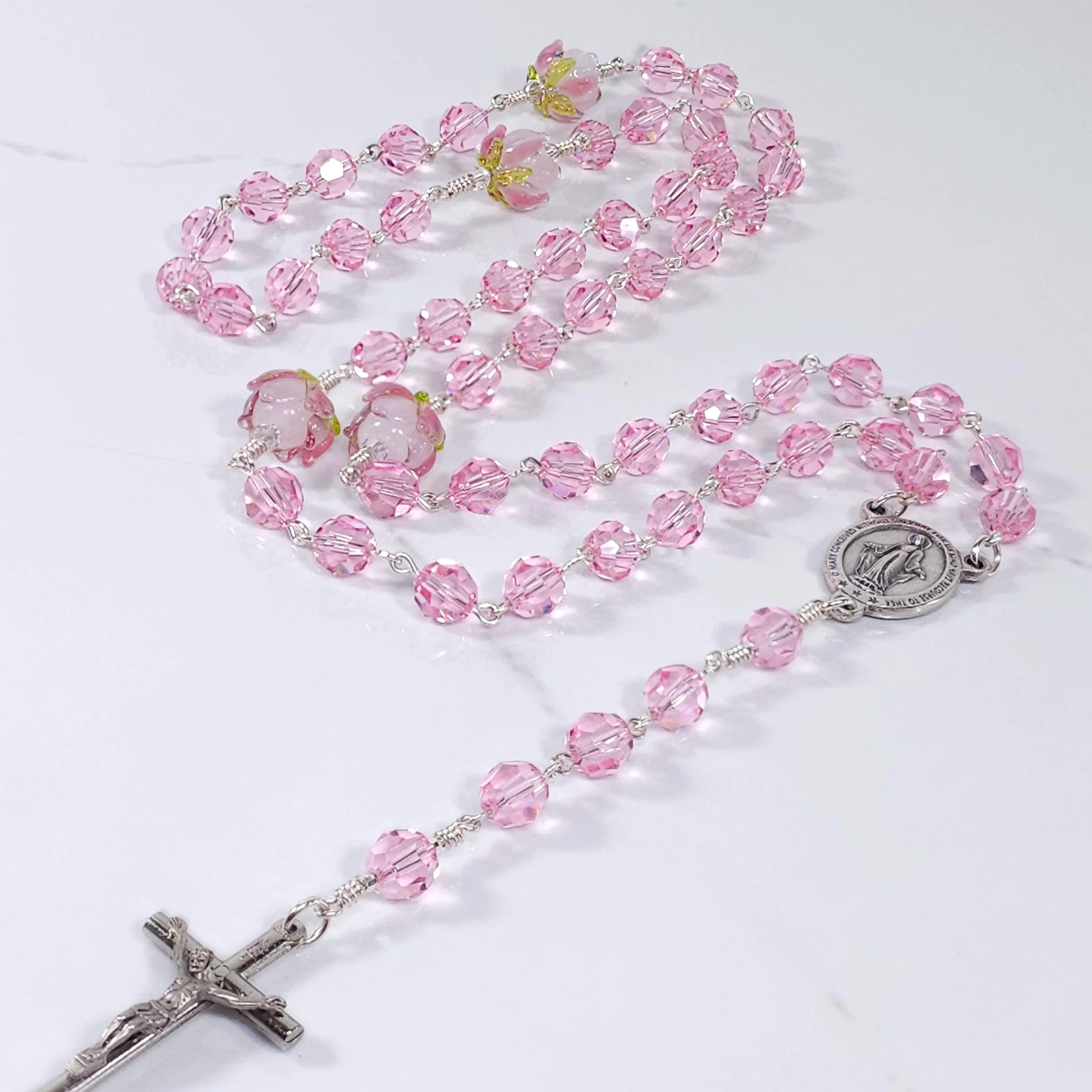 Pink our lady of miraculous medal rosary necklace.