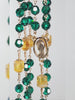 very beautiful green emerald lady of Guadalupe rosary with gold tone.