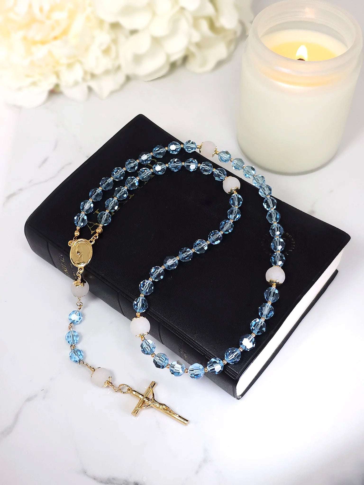 Aquamarine Austrian Crystal Rosary Necklace with genuine blue Swarovski beads and a gold-plated Madonna centerpiece.