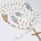 stunning little blue flower rosary for our lady of lourdes,